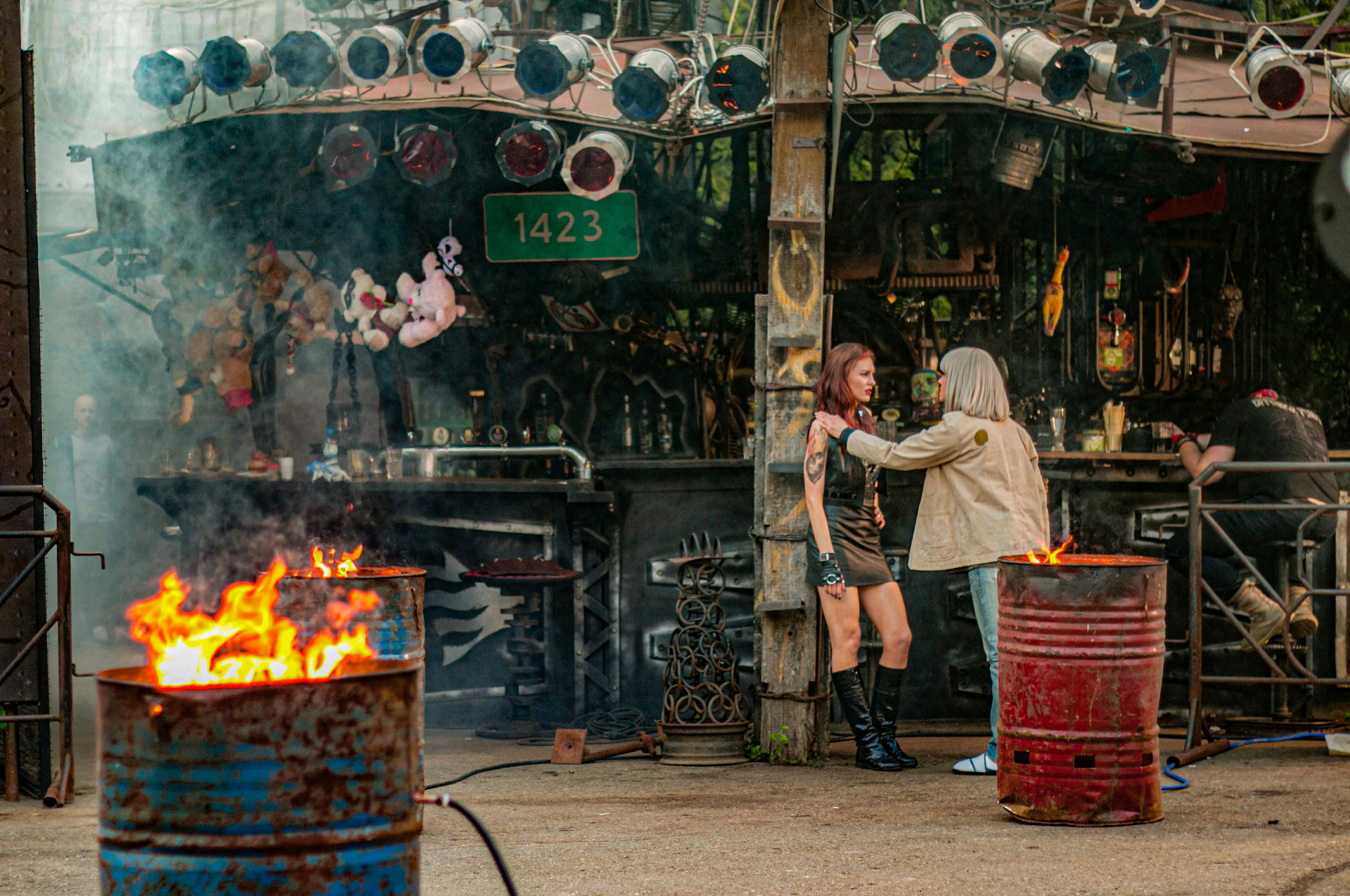 Wide of the bar set with fire barrels and dressing